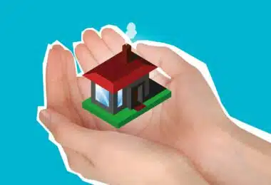 une maison miniature dans le creux des mains